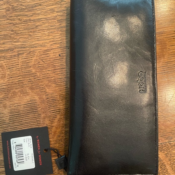 HOBO black leather wallet. NWT zippered pockets, cc slots. It’s kind of perfect. - Picture 6 of 7